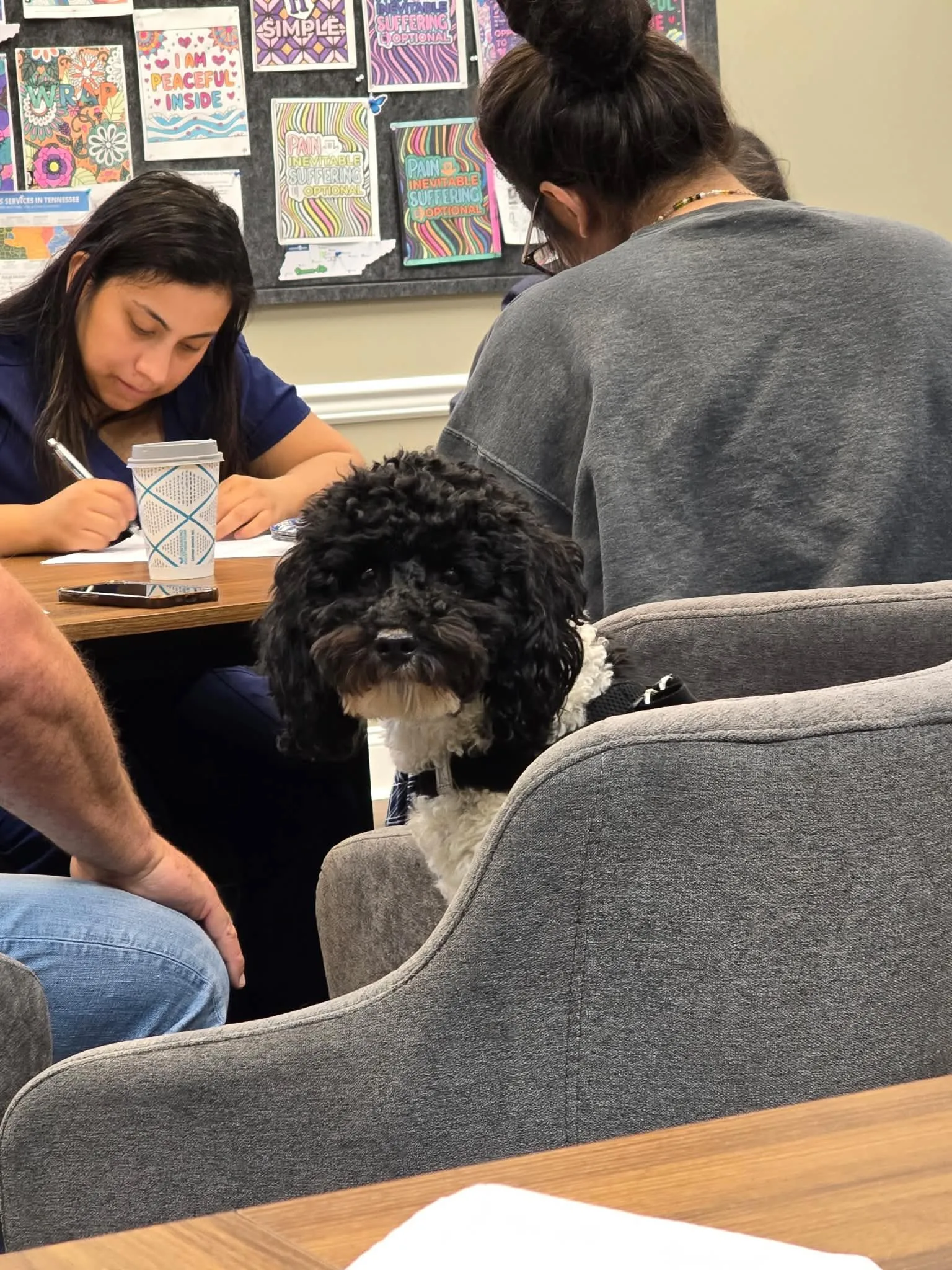 Dog-friendly addiction treatment group session at Restoration Recovery